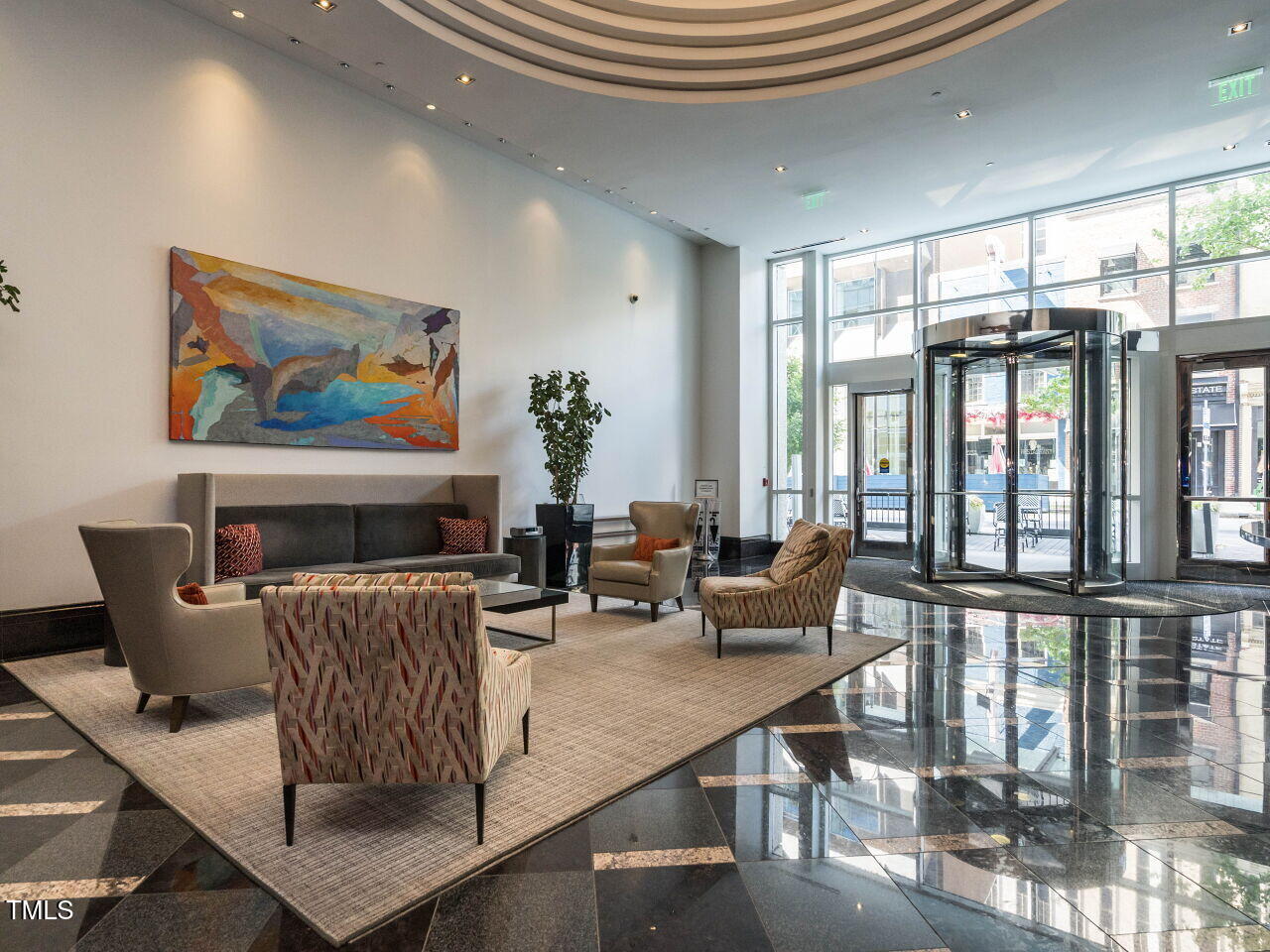 301 Fayetteville Street, Unit 2611 Raleigh, NC 27601 - Photo 35 of 44 a living room with furniture and a large window