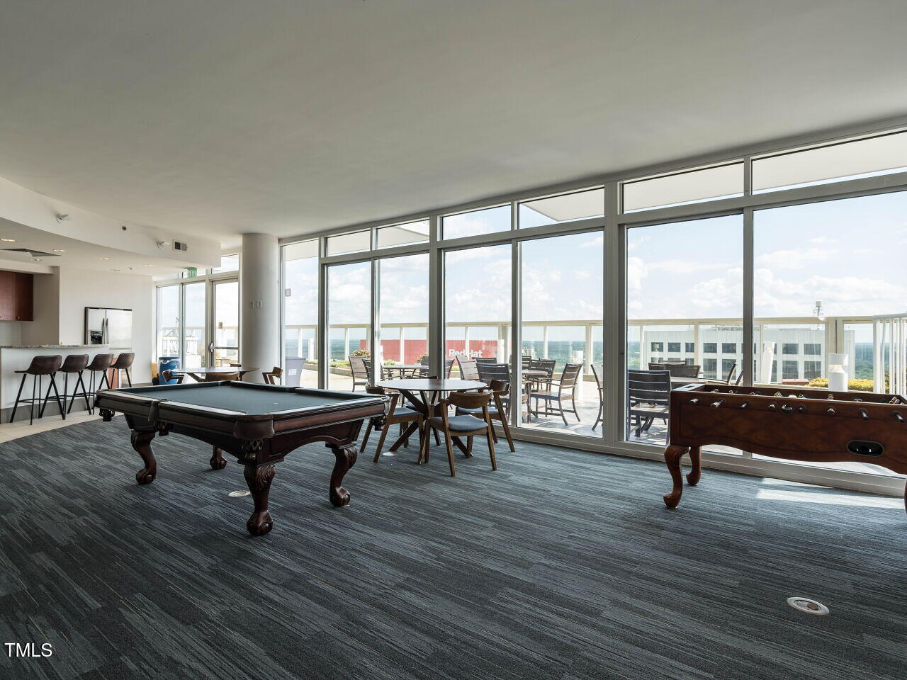 301 Fayetteville Street, Unit 2611 Raleigh, NC 27601 - Photo 37 of 44 a living room with furniture a table and wooden floor
