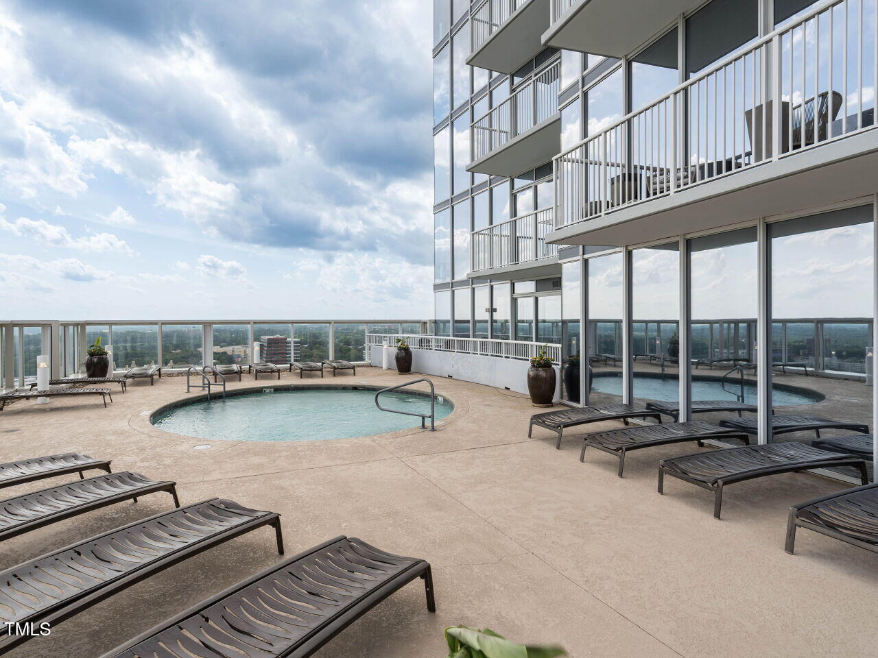 301 Fayetteville Street, Unit 2611 Raleigh, NC 27601 - Photo 41 of 44 a view of a swimming pool with seating area