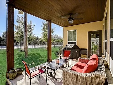 12300 Terraza Circle, Unit TH10 Austin, TX 78726 - Photo 29 of 36 a outdoor space with patio the couches and a dining table with garden view