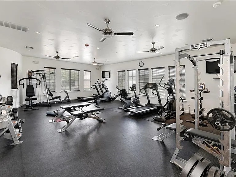 12300 Terraza Circle, Unit TH10 Austin, TX 78726 - Photo 33 of 36 a view of a room with gym equipment