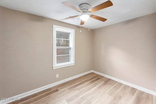 an empty room with a window