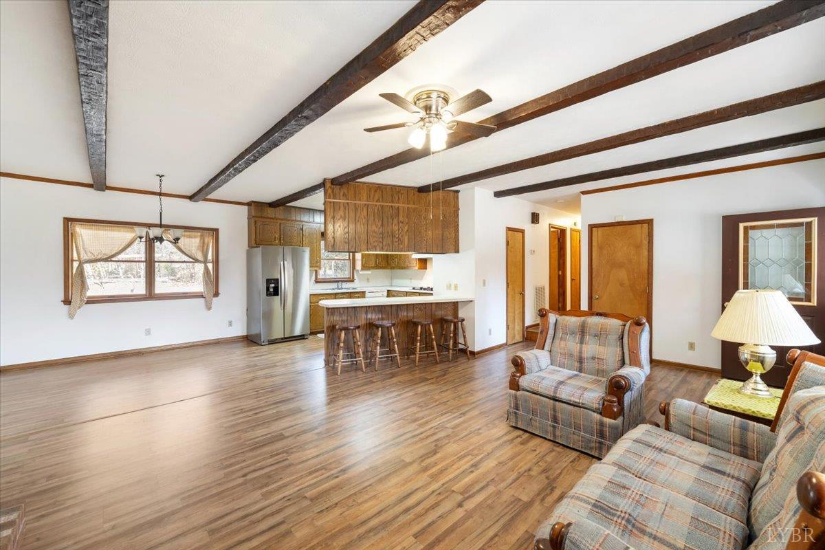 391 Pond Road Buckingham, VA 23921 - Photo 11 of 75 a living room with furniture and wooden floor
