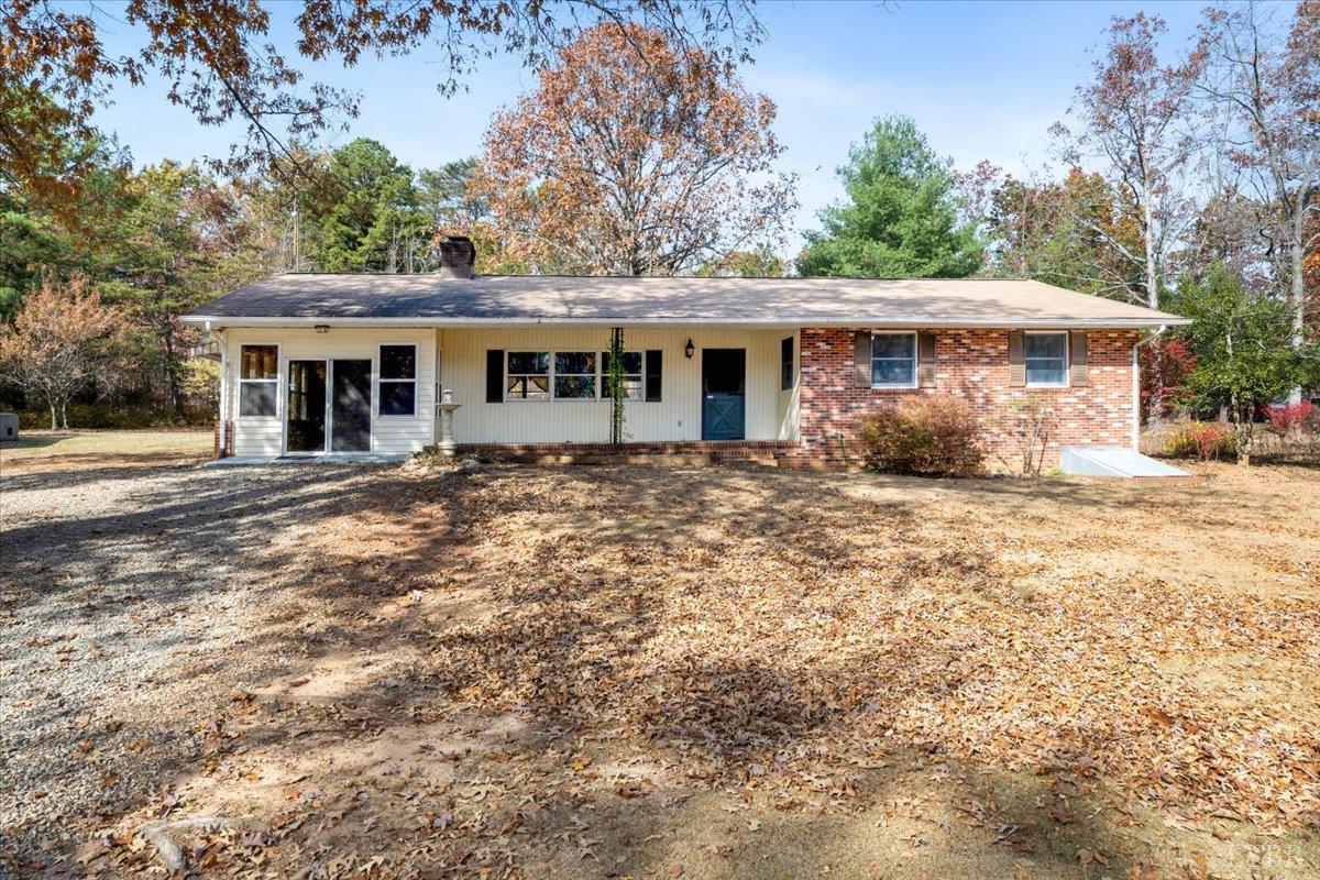 391 Pond Road Buckingham, VA 23921 - Photo 2 of 75 a front view of a house with a garden