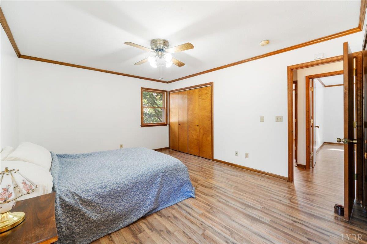 391 Pond Road Buckingham, VA 23921 - Photo 31 of 75 a view of livingroom with hardwood floor and ceiling fan