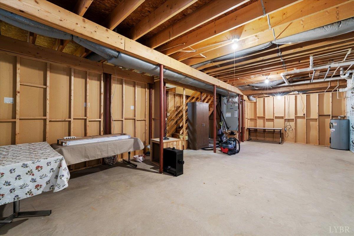 391 Pond Road Buckingham, VA 23921 - Photo 41 of 75 a bedroom with bed and a large window