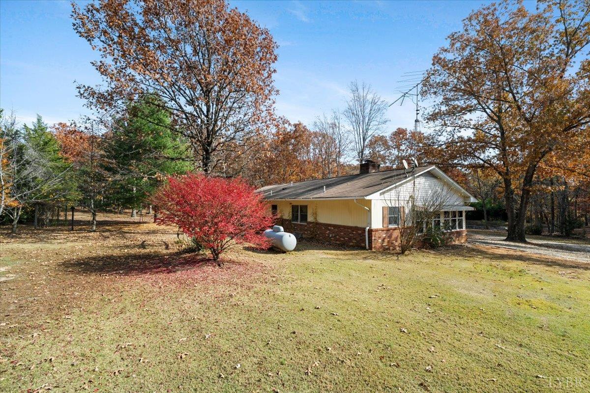 391 Pond Road Buckingham, VA 23921 - Photo 43 of 75 a view of a house with yard and sitting area