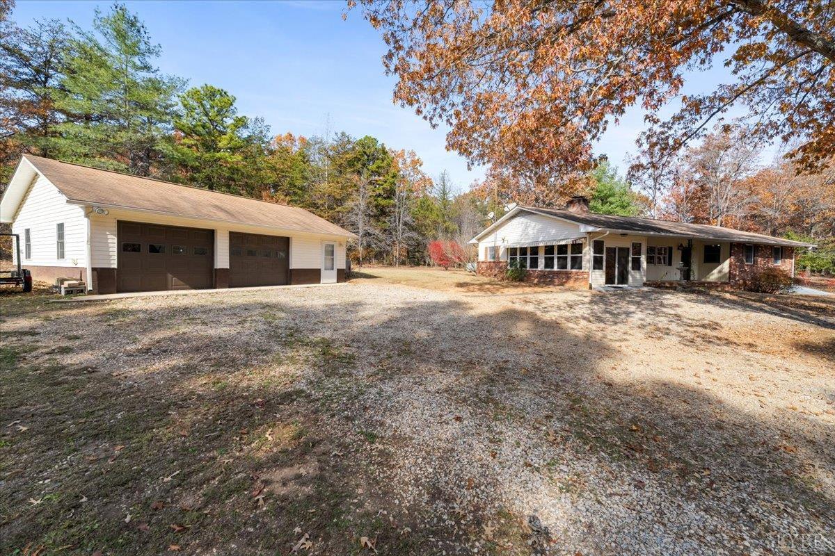 391 Pond Road Buckingham, VA 23921 - Photo 50 of 75 a front view of a house with a yard