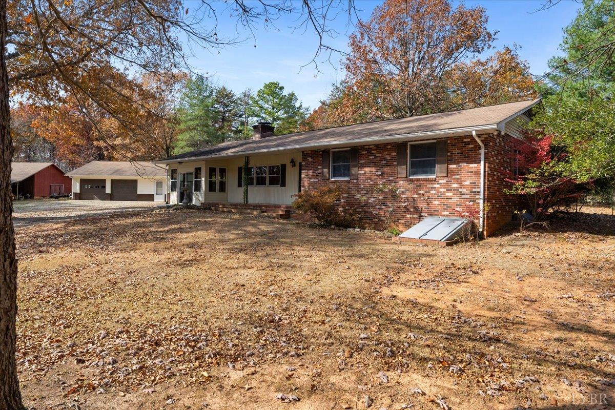 391 Pond Road Buckingham, VA 23921 - Photo 51 of 75 a front view of a house with a yard