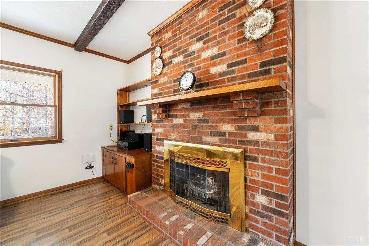 391 Pond Road Buckingham, VA 23921 - Photo 10 of 75 a kitchen with stainless steel appliances wooden floor and a sink