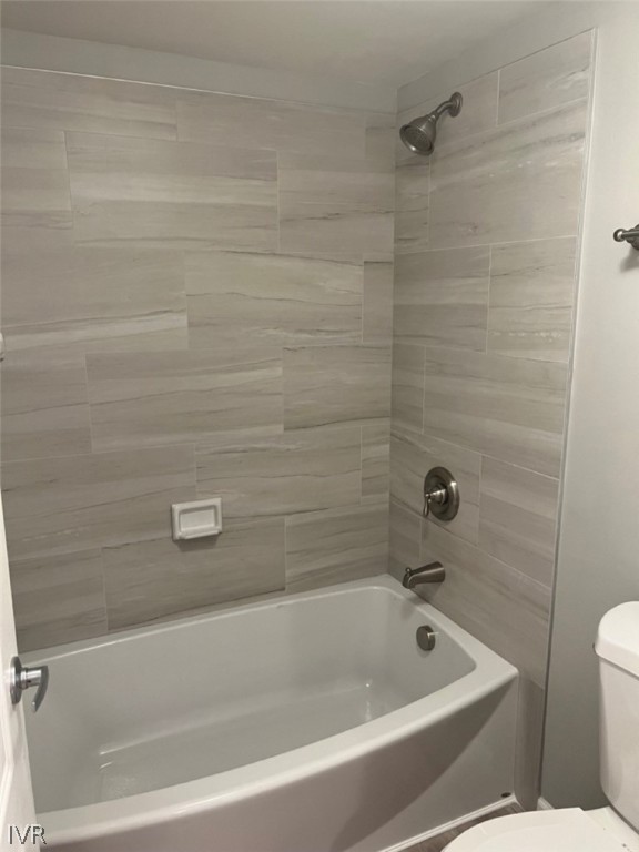 115 Tramway Drive, Unit 2 Stateline, NV 89449 - Photo 10 of 18 a bathroom with a bathtub and a toilet
