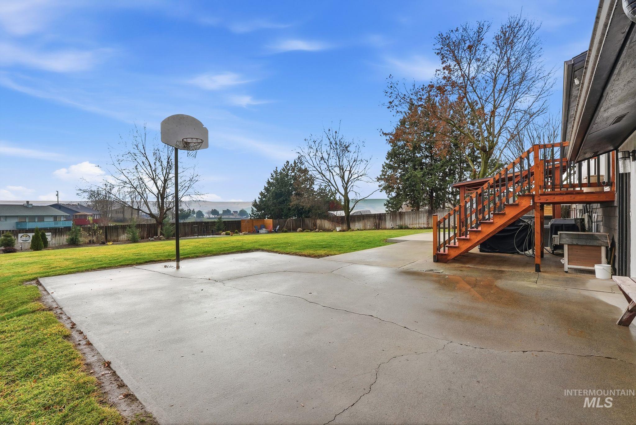 2435 Easy Street Clarkston, WA 99403 - Photo 36 of 49 Fenced backyard with stairs and a patio