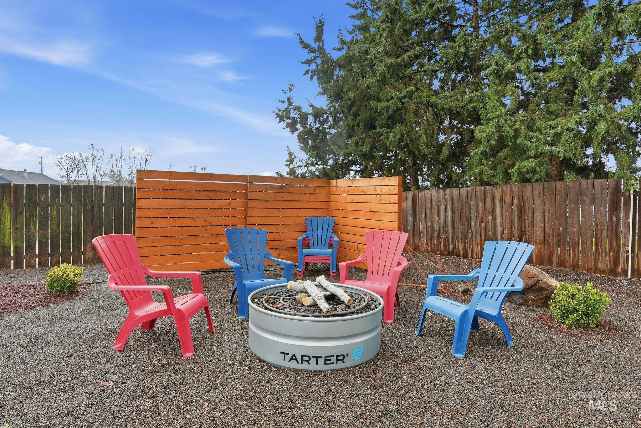 2435 Easy Street Clarkston, WA 99403 - Photo 42 of 49 Fenced backyard with a fire pit