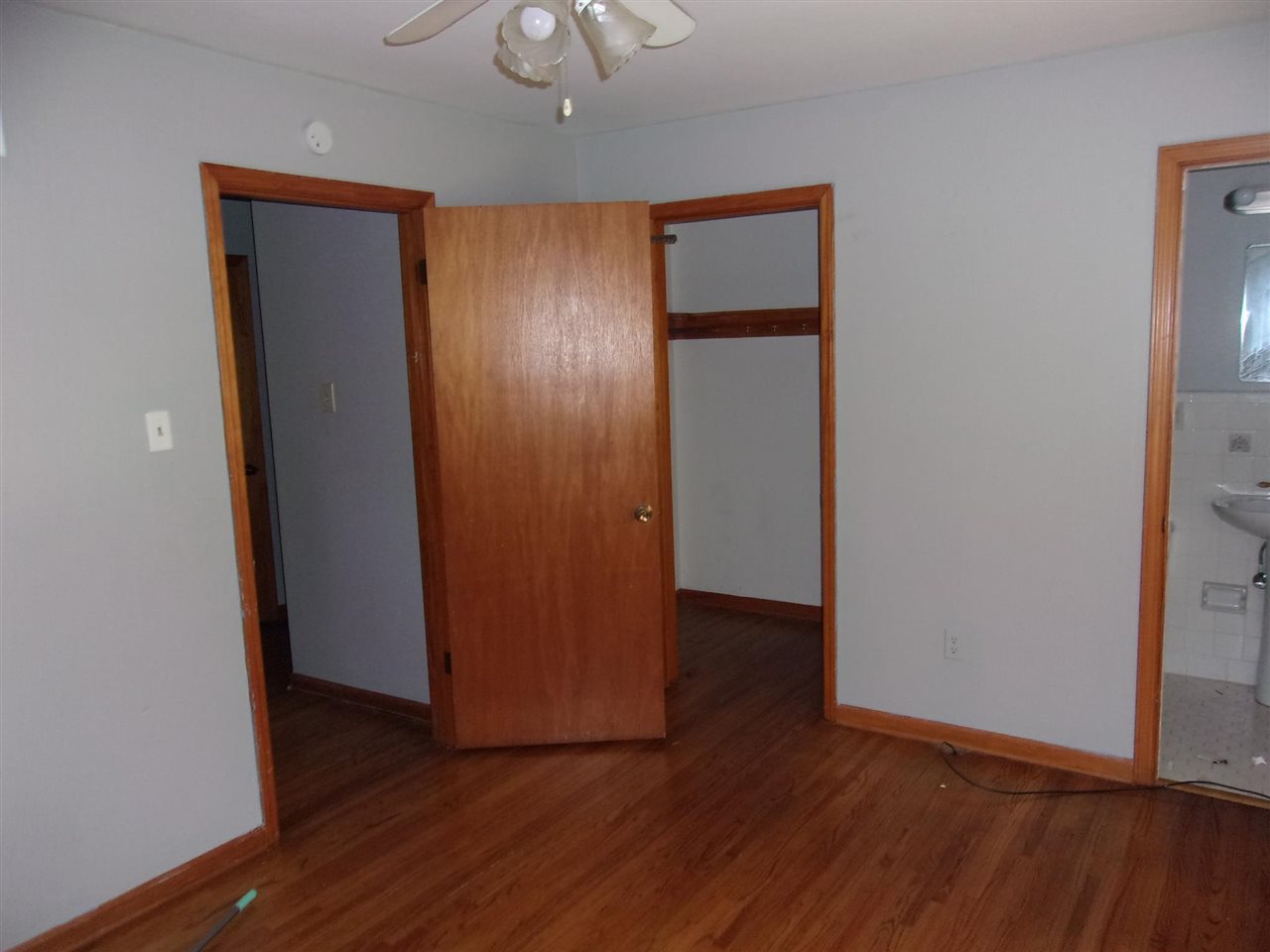4440 Yale Road Memphis, TN 38128 - Photo 15 of 24 an empty room with wooden floor and closet