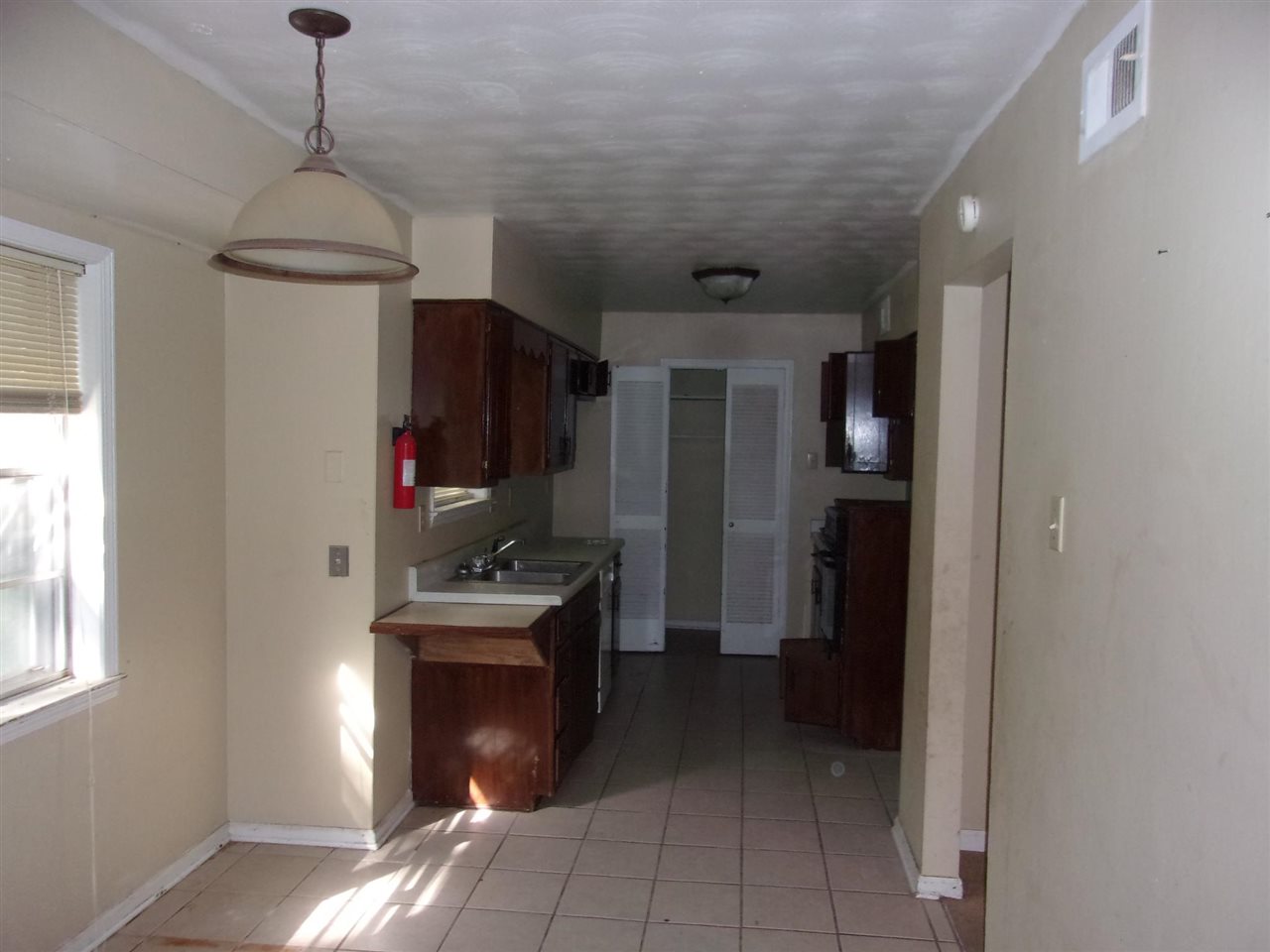 4440 Yale Road Memphis, TN 38128 - Photo 22 of 24 a hallway with furniture and a fireplace