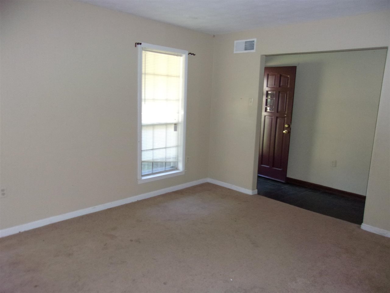 4440 Yale Road Memphis, TN 38128 - Photo 24 of 24 an empty room with windows