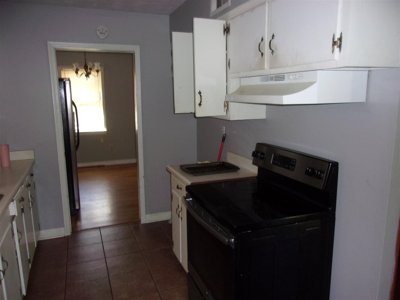 4440 Yale Road Memphis, TN 38128 - Photo 5 of 24 a kitchen with granite countertop cabinets and steel stainless steel appliances