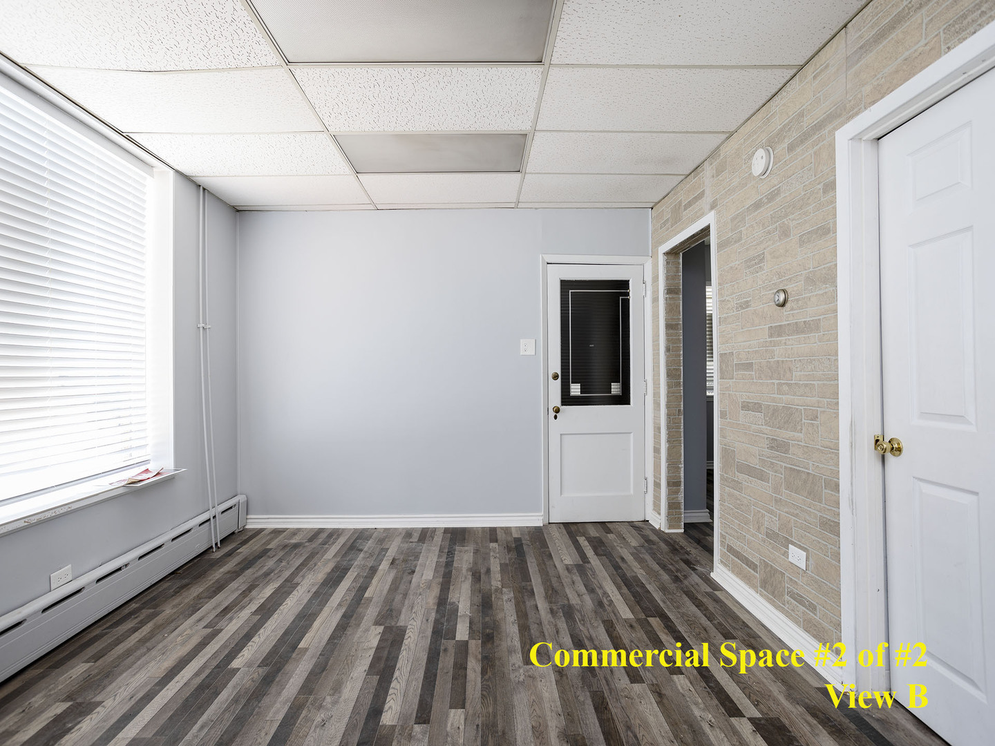 7929 Ogden Avenue Lyons, IL 60534 - Photo 14 of 44 a bedroom with a bed and a window