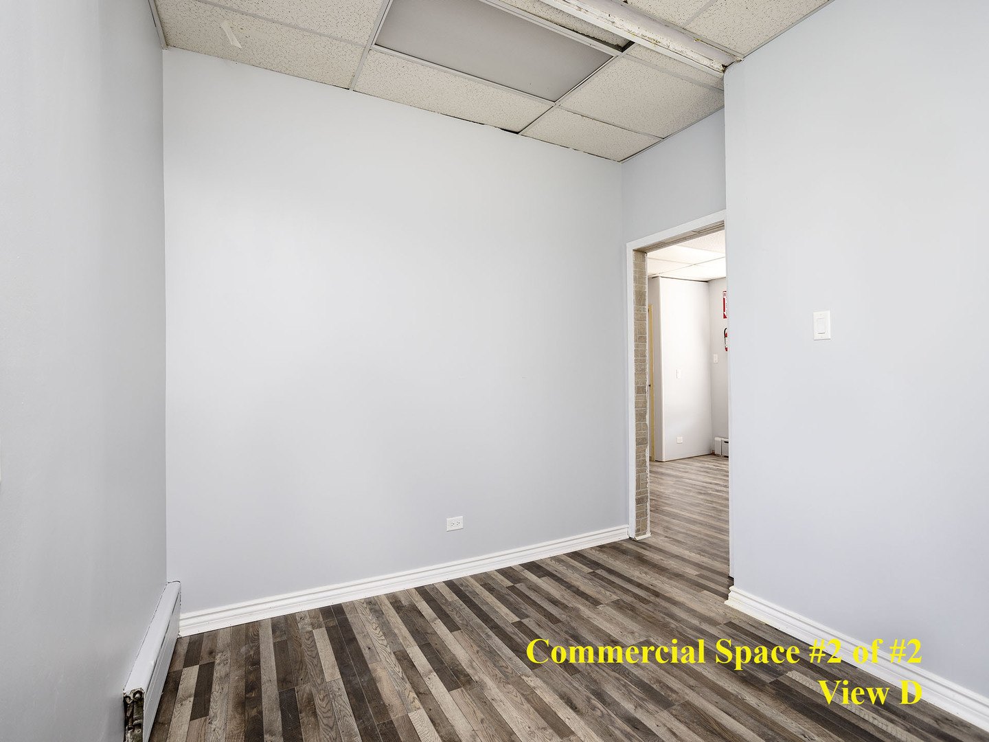 7929 Ogden Avenue Lyons, IL 60534 - Photo 16 of 44 a view of a room with wooden floor