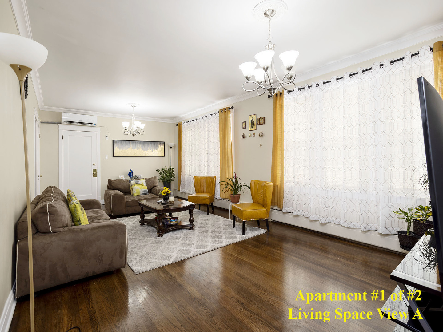 7929 Ogden Avenue Lyons, IL 60534 - Photo 19 of 44 a living room with furniture and a chandelier