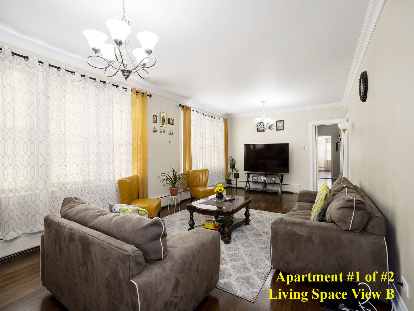 7929 Ogden Avenue Lyons, IL 60534 - Photo 20 of 44 a living room with furniture and a flat screen tv