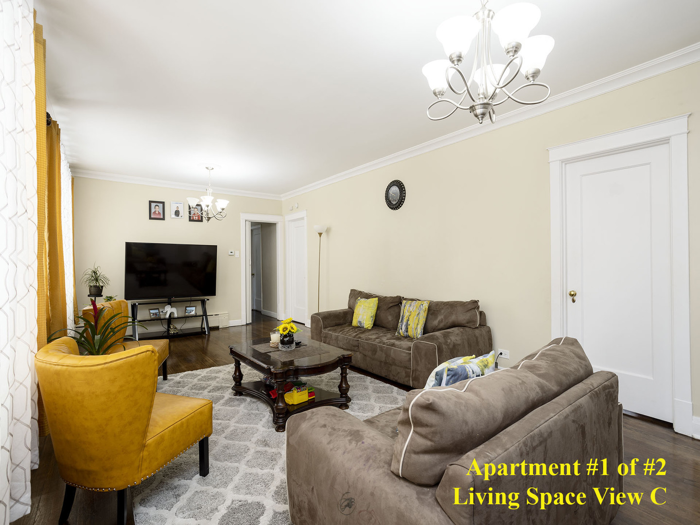 7929 Ogden Avenue Lyons, IL 60534 - Photo 21 of 44 a living room with furniture and a flat screen tv