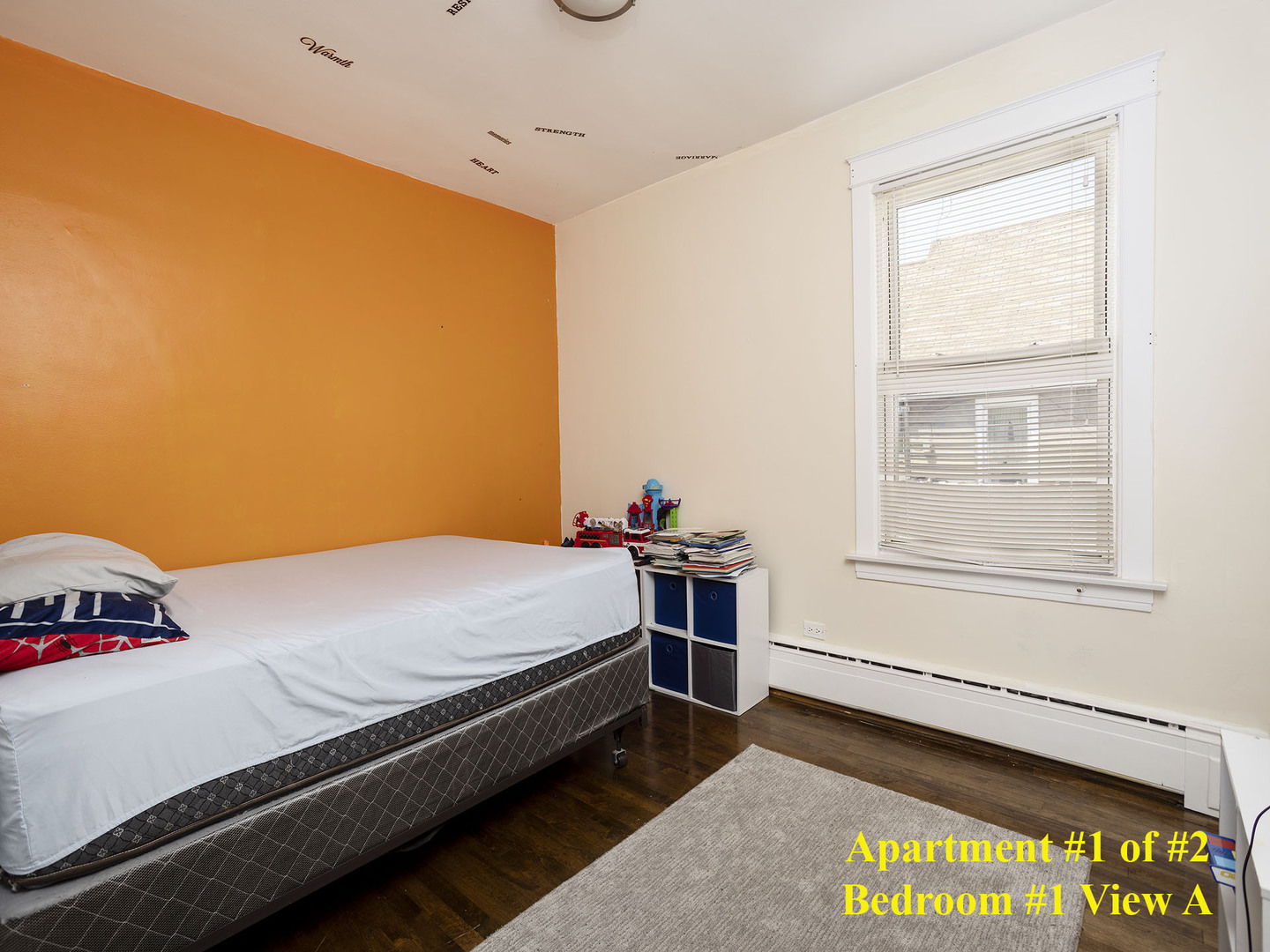 7929 Ogden Avenue Lyons, IL 60534 - Photo 23 of 44 a bedroom with a bed and a window