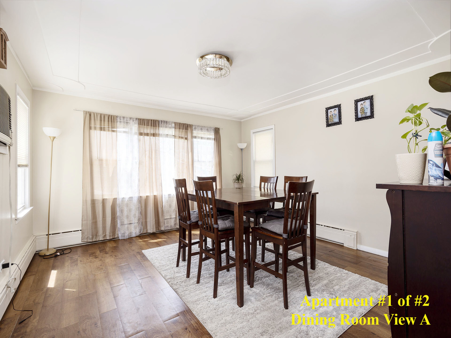 7929 Ogden Avenue Lyons, IL 60534 - Photo 27 of 44 a view of a dining room with furniture and a window