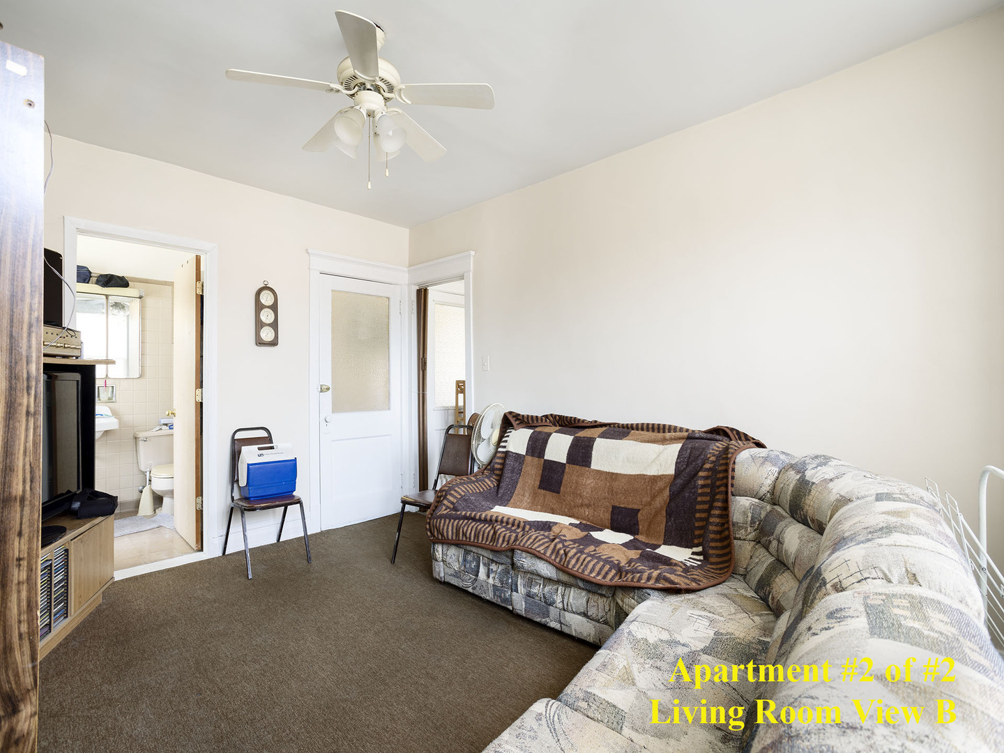 7929 Ogden Avenue Lyons, IL 60534 - Photo 33 of 44 a bedroom with furniture and a couch