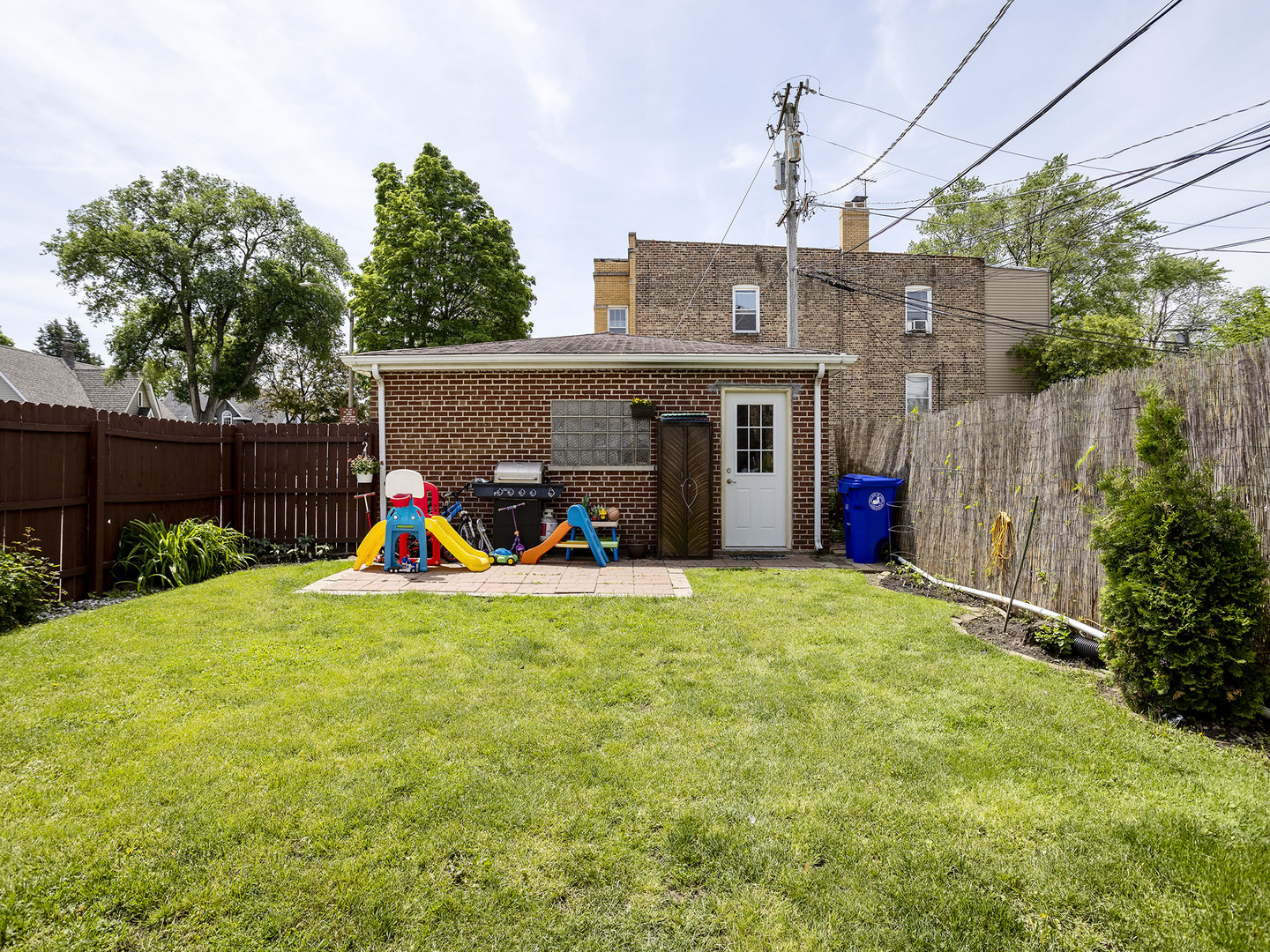 7929 Ogden Avenue Lyons, IL 60534 - Photo 40 of 44 a view of a house with backyard and porch