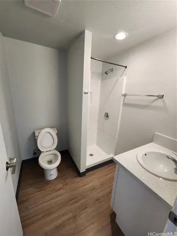 a bathroom with a sink and toilet