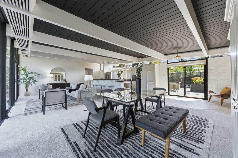 2203 Allegheny Way San Mateo, CA 94402 - Photo 13 of 56 a view of a patio with table and chairs and potted plants