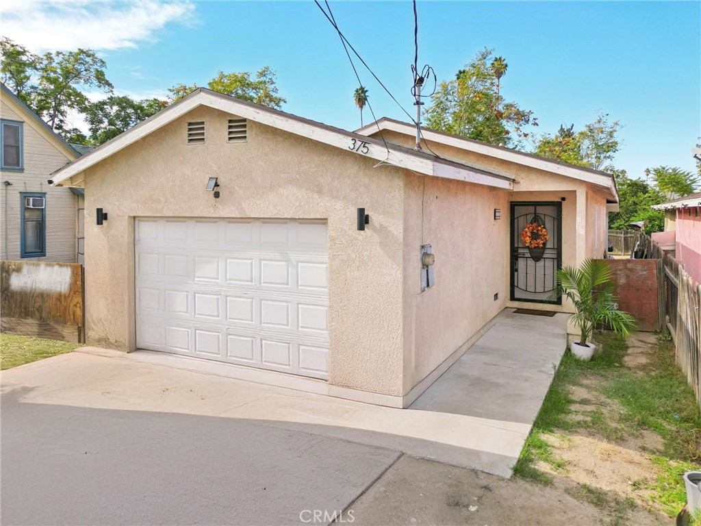 a front view of a house with a garage