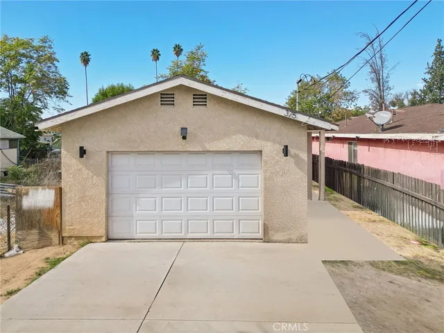 a view of a house with a garage
