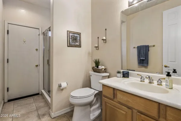 a kitchen with refrigerator cabinets dining table and chairs