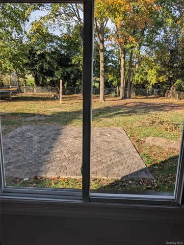 a view of a yard from a window