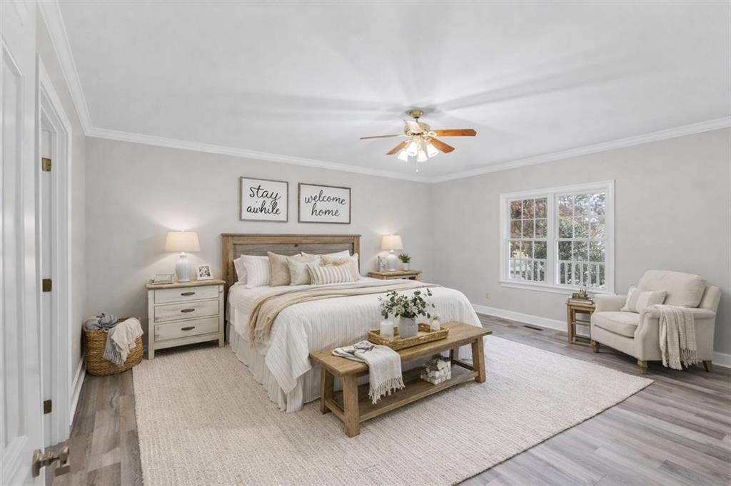 4003 Garden Lakes Parkway Rome, GA 30165 - Photo 8 of 20 a bed room with a bed and a chair