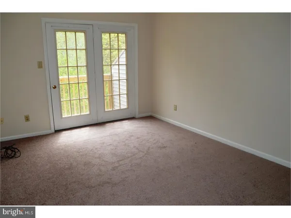 a view of a room that has a window in it