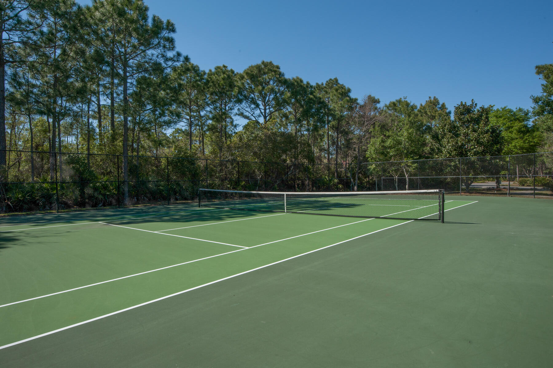 4372 Stonebridge Road Destin, FL 32541 - Photo 77 of 83 a view of a tennis court