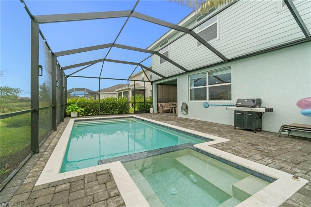 2118 Hamlin Street Naples, FL 34120 - Photo 25 of 41 a view of a backyard with a sink and dishwasher