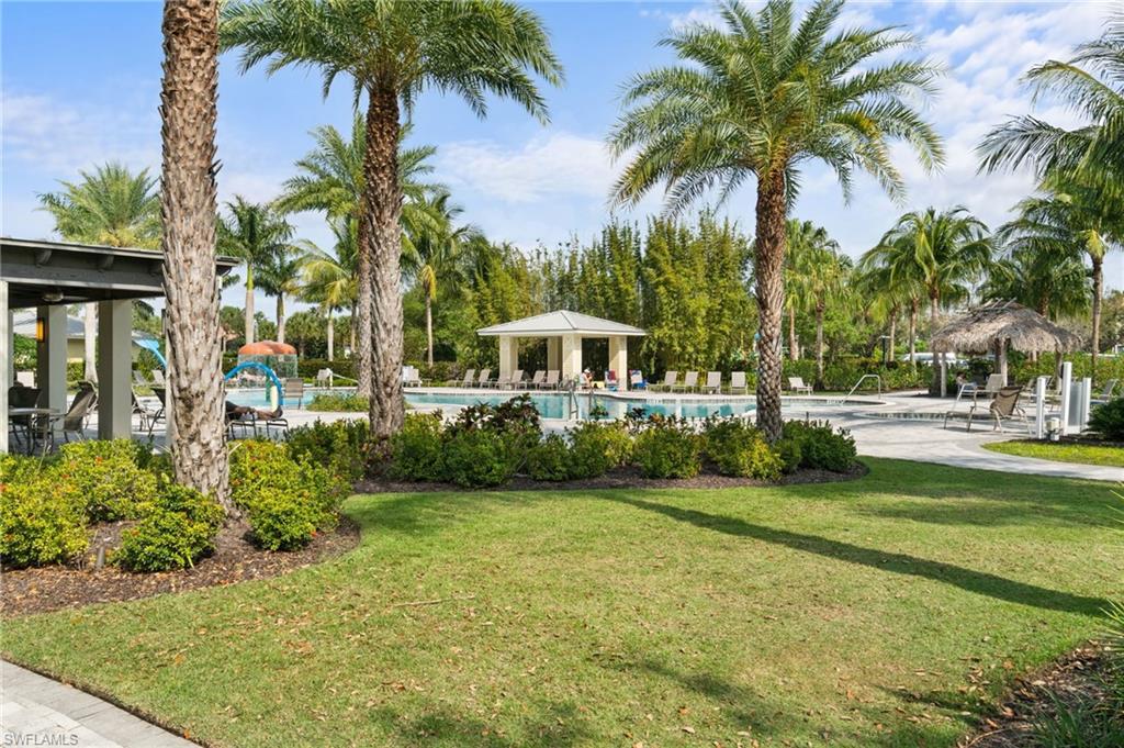 2118 Hamlin Street Naples, FL 34120 - Photo 40 of 41 a front view of a house with swimming pool