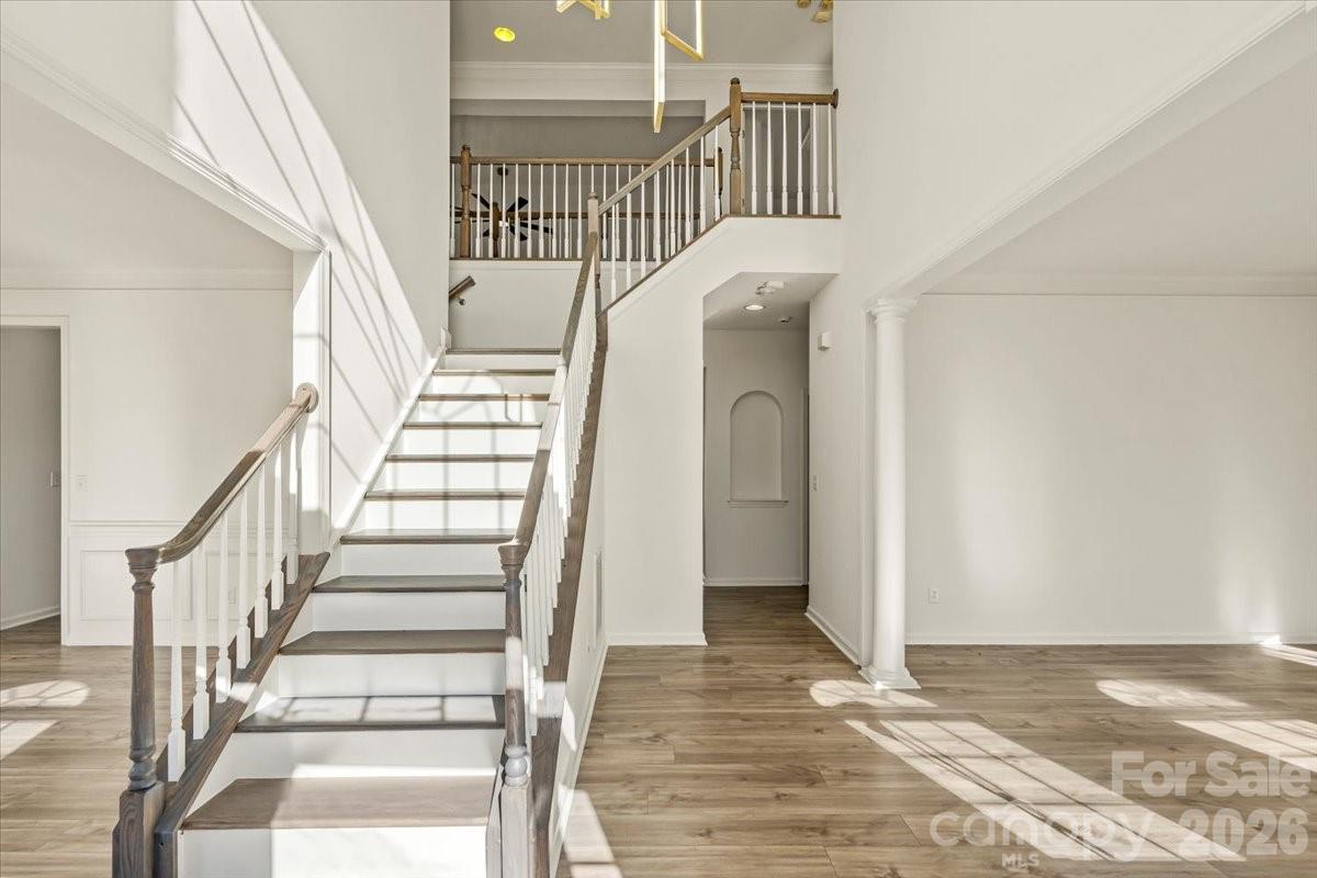 7215 Conifer Circle Indian Trail, NC 28079 - Photo 3 of 34 a view of entryway and hall with wooden floor