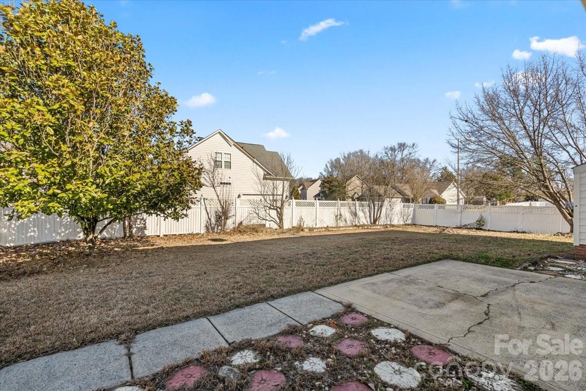 7215 Conifer Circle Indian Trail, NC 28079 - Photo 33 of 34 a view of a yard with large trees