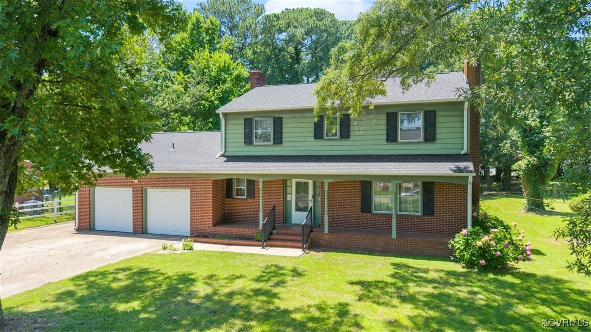 43 Franktown Road Hampton, VA 23663 - Photo 14 of 47 Traditional home featuring a chimney, a garage, dr