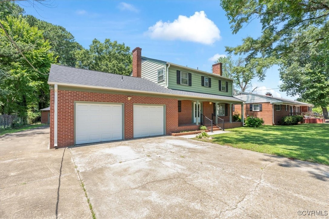 43 Franktown Road Hampton, VA 23663 - Photo 3 of 47 View of front facade with brick siding, an attache
