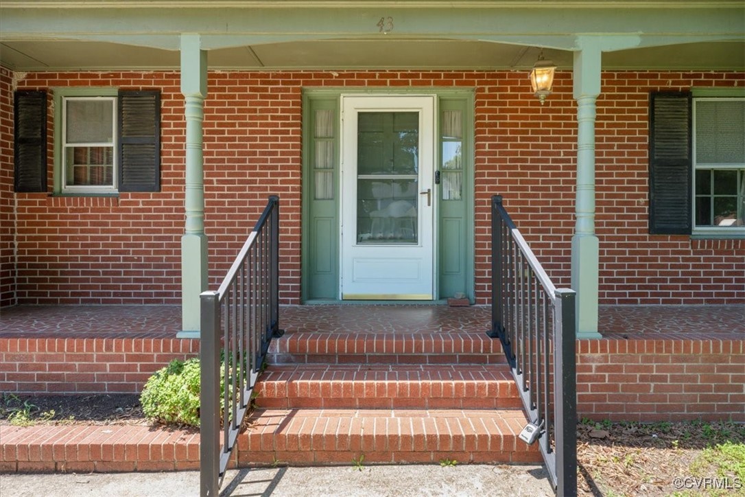 43 Franktown Road Hampton, VA 23663 - Photo 4 of 47 Property entrance featuring brick siding and cover