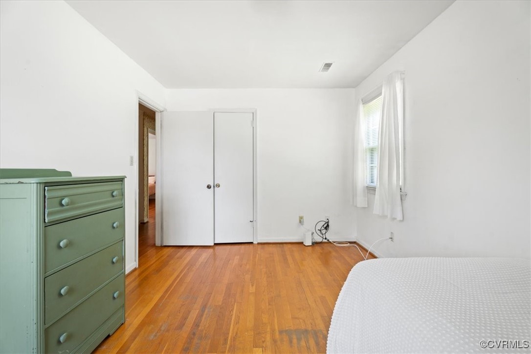 43 Franktown Road Hampton, VA 23663 - Photo 42 of 47 Bedroom with light wood finished floors and basebo