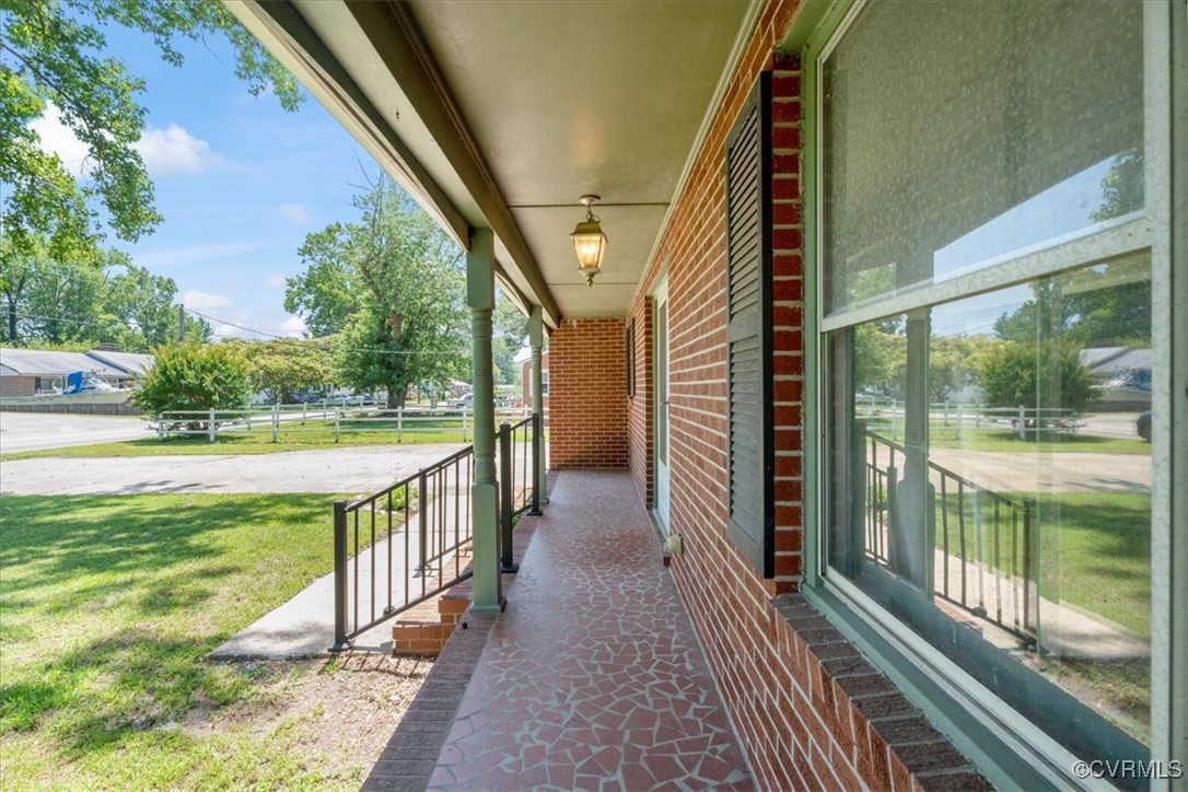 43 Franktown Road Hampton, VA 23663 - Photo 5 of 47 Covered porch with a lawn