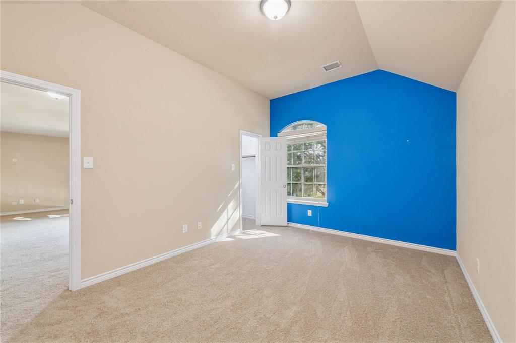 425 Windward Drive Murphy, TX 75094 - Photo 12 of 31 an empty room with windows