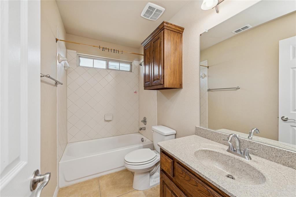 425 Windward Drive Murphy, TX 75094 - Photo 16 of 31 a bathroom with a sink toilet and shower